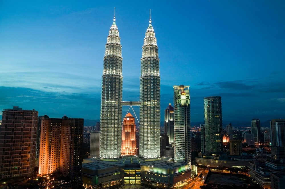 Petronas Twin Towers iconic skyscrapers in Kuala Lumpur Malaysia city skyline